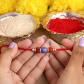 Dual Rudraksha With Blue Om Bead Silver Rakhi